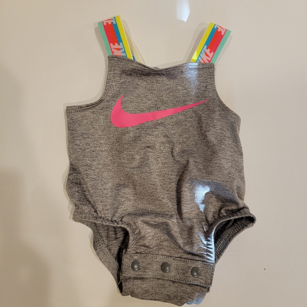 Nike newborn baby girl bathing suit in grey an neon rainbow stripe